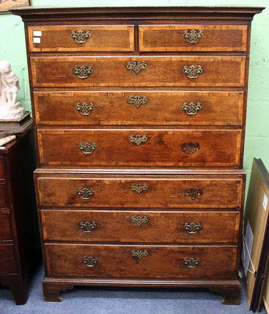 Appraisal: AN TH CENTURY OAK AND MAHOGANY TALLBOY fitted with two