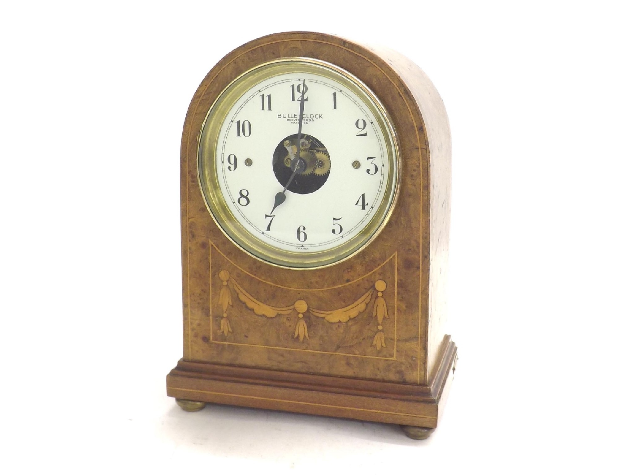 Appraisal: Electric mantel Bulle-Clock the white dial with skeletonised centre within