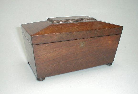 Appraisal: A Victorian rosewood sarcophagus tea caddy