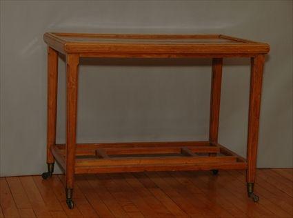 Appraisal: Two-Tiered Table with Castors