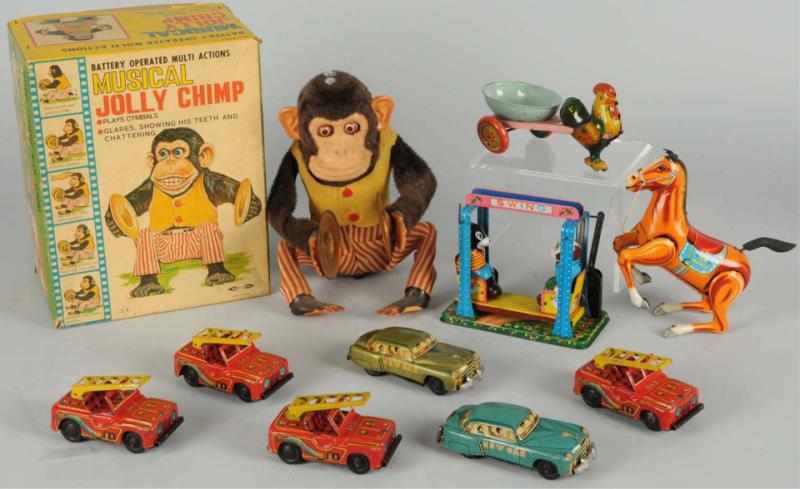 Appraisal: Lot of Miscellaneous Tin Toys Includes Jolly Chimp in original