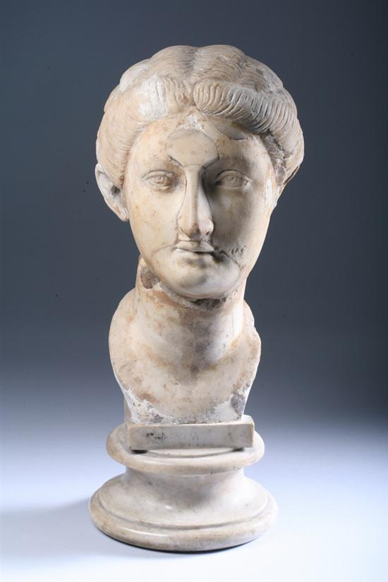 Appraisal: ROMAN WHITE MARBLE BUST OF A WOMAN With wavy hair