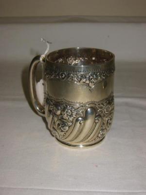 Appraisal: A VICTORIAN MUG of ovoid form with loop handle embossed