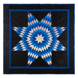 Appraisal: An Amish Eight Point Star Pieced Cotton and Satin Quilt