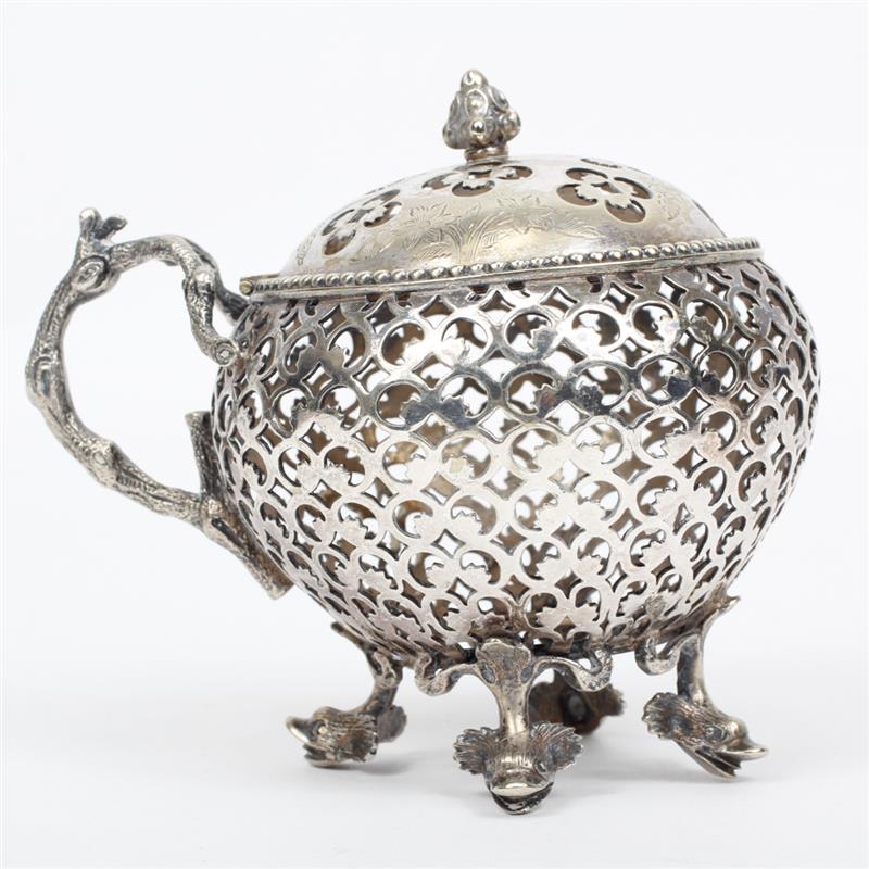 Appraisal: Victorian pierced silver lidded mustard pot with dolphin feet and