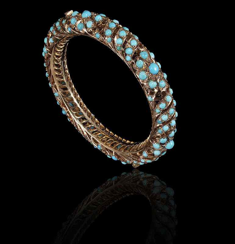 Appraisal: K GOLD AND TURQUOISE BANGLE BRACELET K yellow gold hinged