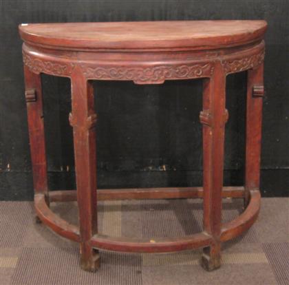 Appraisal: Chinese softwood demi-luna hall table late qing dynasty Red stained