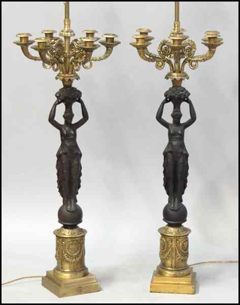 Appraisal: PAIR OF EMPIRE STYLE BRONZE AND GILT METAL TABLE LAMPS