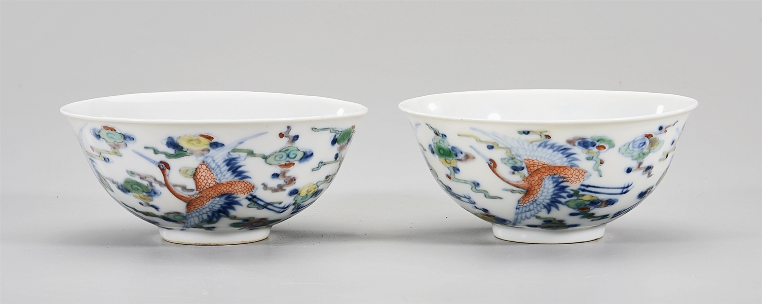 Appraisal: Pair of Chinese doucai and enameled porcelain bowls depicting cranes