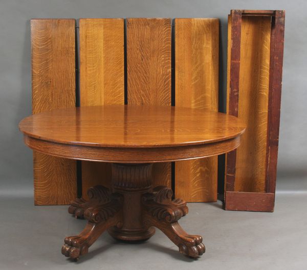 Appraisal: Exceptional golden tiger oak table with split claw feet l