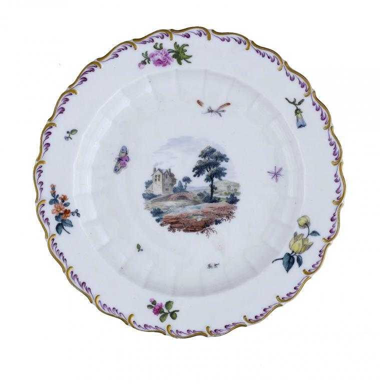 Appraisal: A DERBY PLATE painted in polychrome with a house with