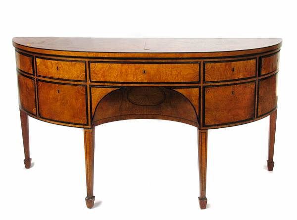 Appraisal: A George III style parcel ebonized burl elm bowfront sideboard