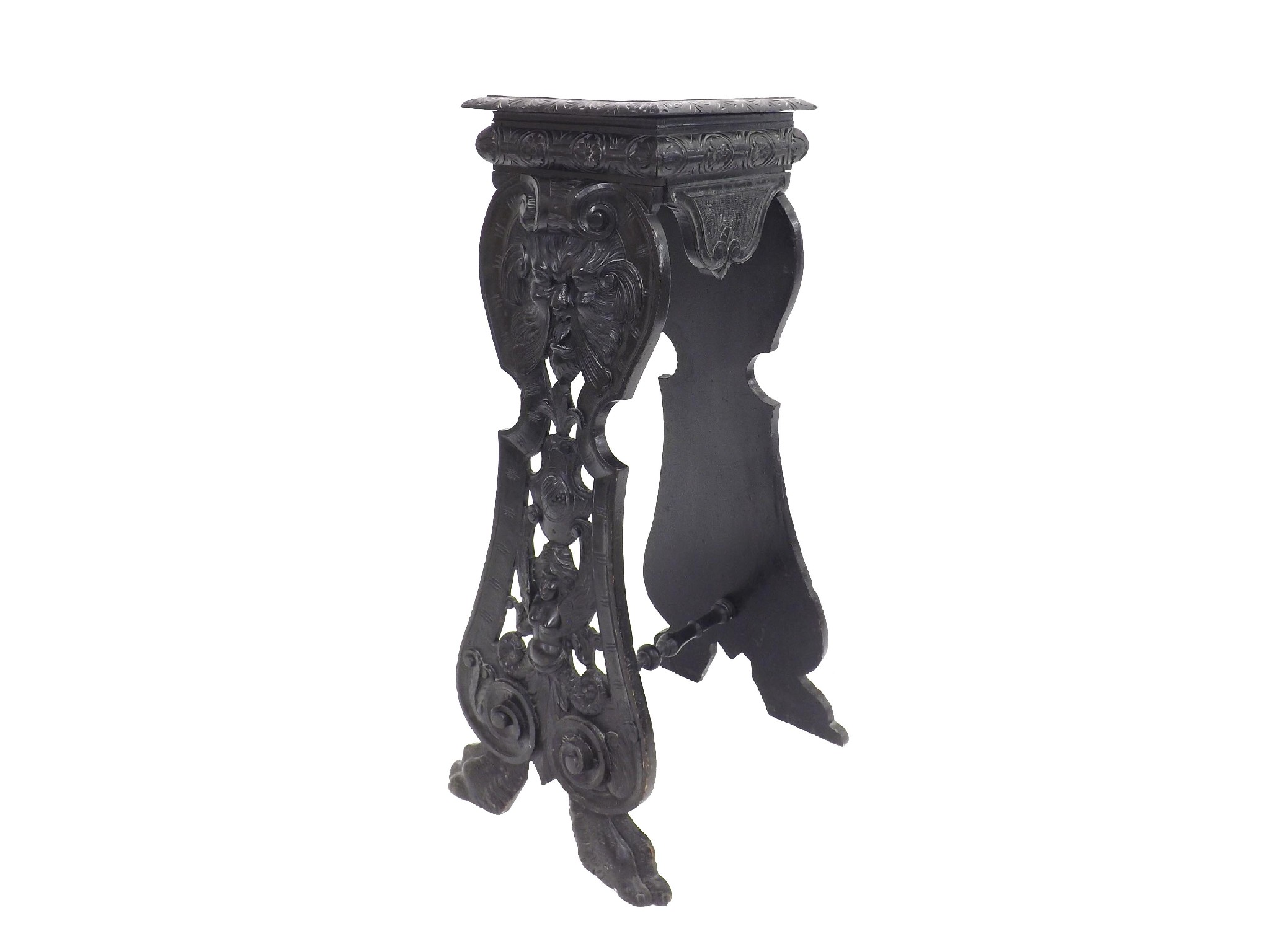 Appraisal: Interesting English antique ebonised oak torchere carved with a grotesque