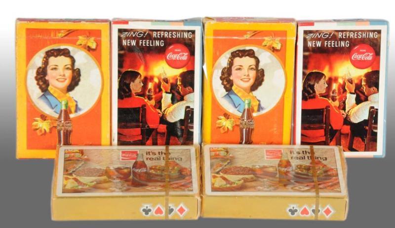 Appraisal: Lot of Coca-Cola Playing Card Decks Description Includes two unopened