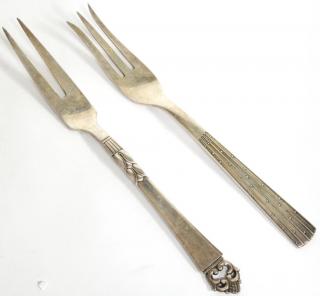 Appraisal: Vintage Danish Sterling Serving Forks Comprising a two-tine Frigast Denmark