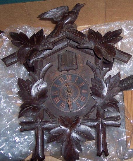 Appraisal: A Black Forest cuckoo clock in a carved case