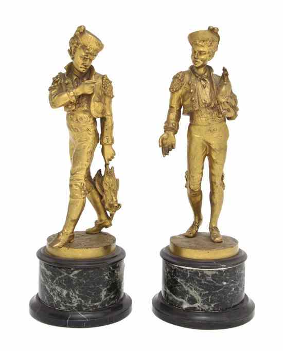 Appraisal: Two French Gilt Bronze Figures Lalouette each depicting a youth