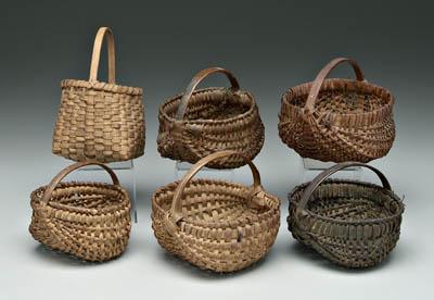 Appraisal: Six miniature oak split baskets five egg baskets and one