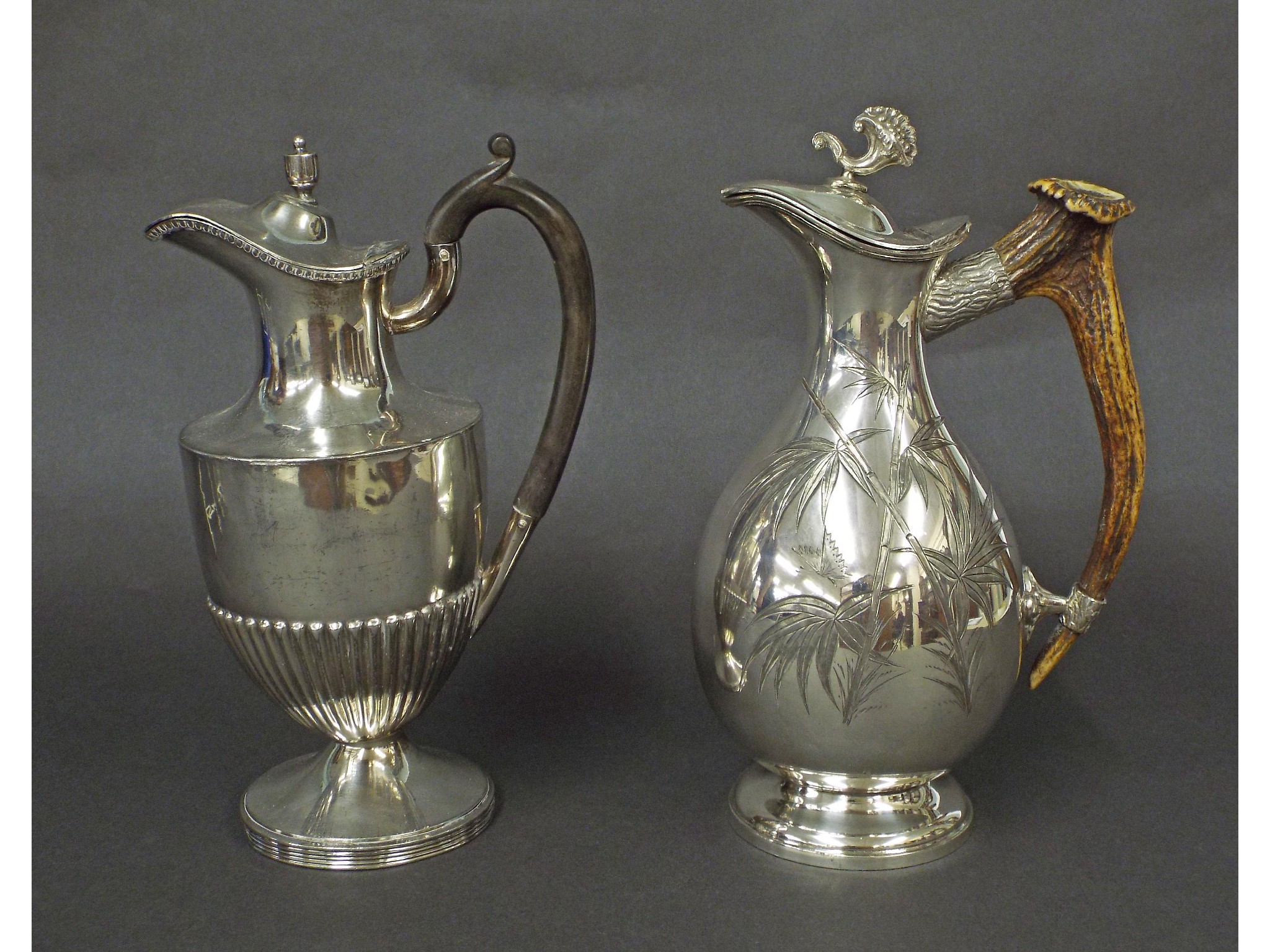 Appraisal: Silver plated baluster water jug engraved with bamboo and butterflies