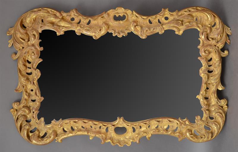 Appraisal: GERMAN ROCOCO GILTWOOD OVERMANTLE MIRROR The rectangular mirror plate within