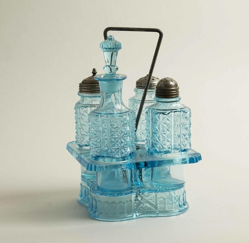 Appraisal: American Pressed Glass Cruet Set American pressed glass cruet set