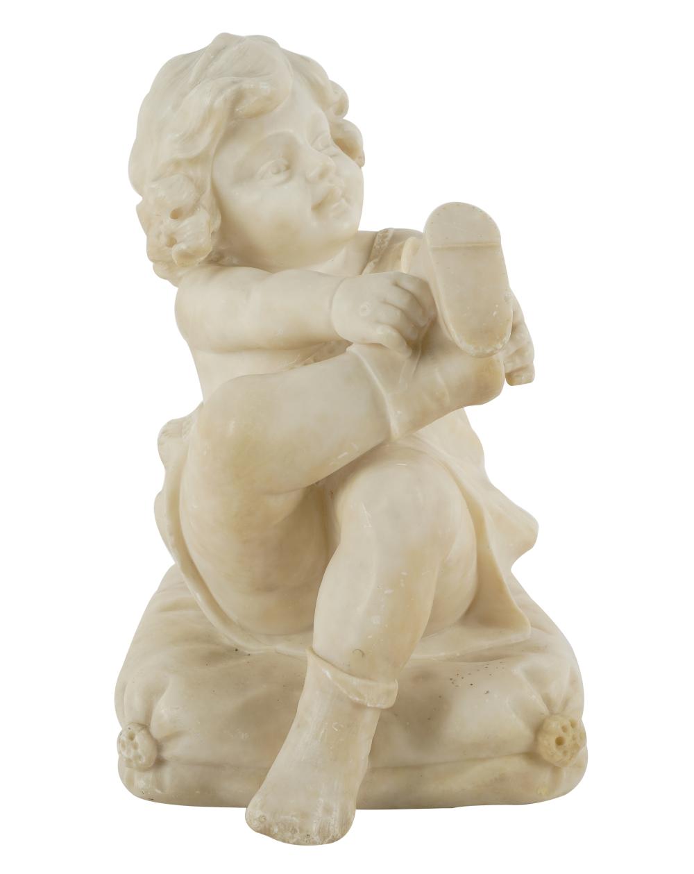 Appraisal: ITALIAN CARVED MARBLE FIGUREdepicting a seated girl putting on shoes