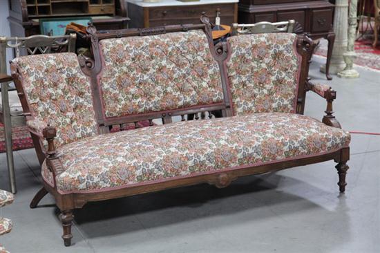 Appraisal: VICTORIAN SETTEE Walnut having carved and incised decoration turned legs