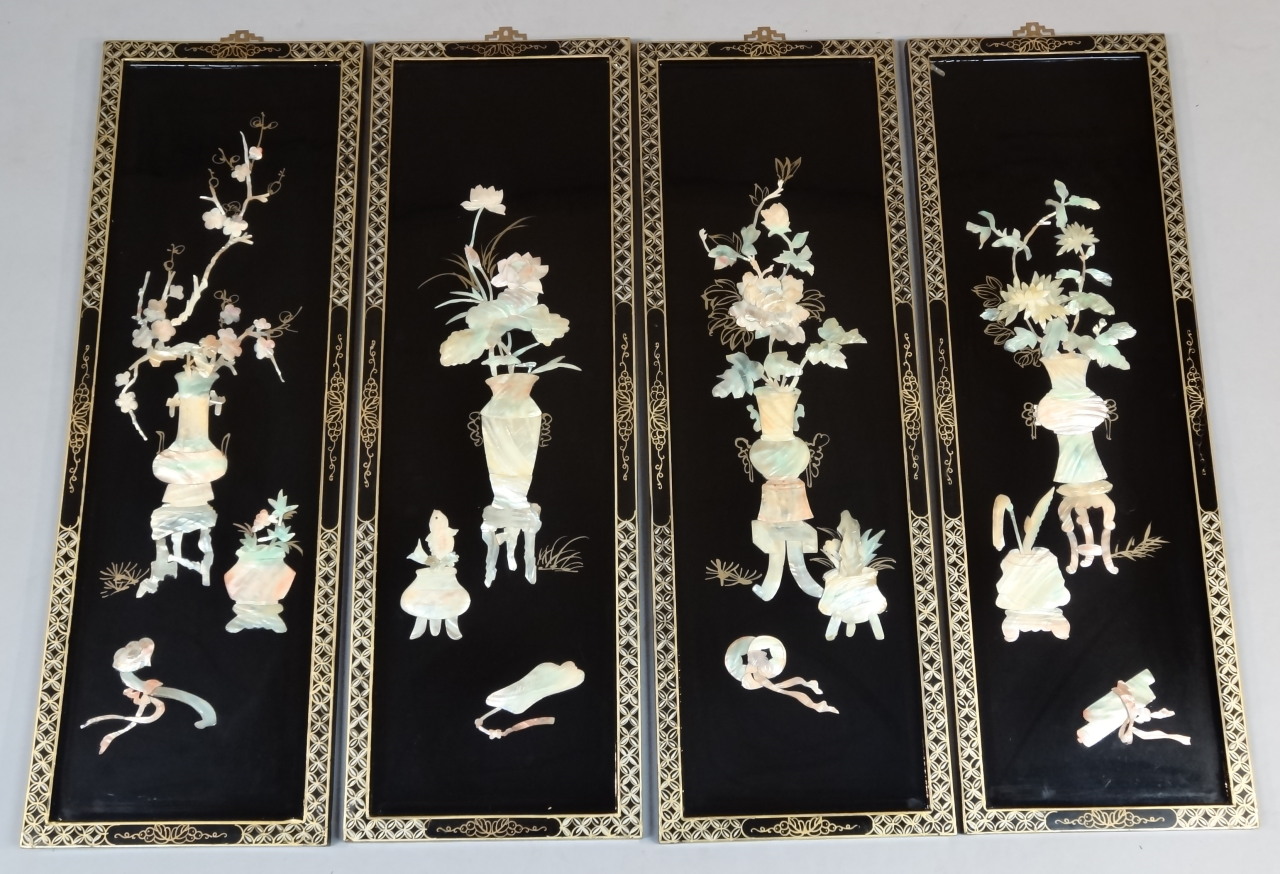 Appraisal: A set of four thC lacquer panels each highly decorative