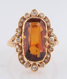 Appraisal: A VINTAGE CITRINE AND DIAMOND K GOLD FASHION RING The