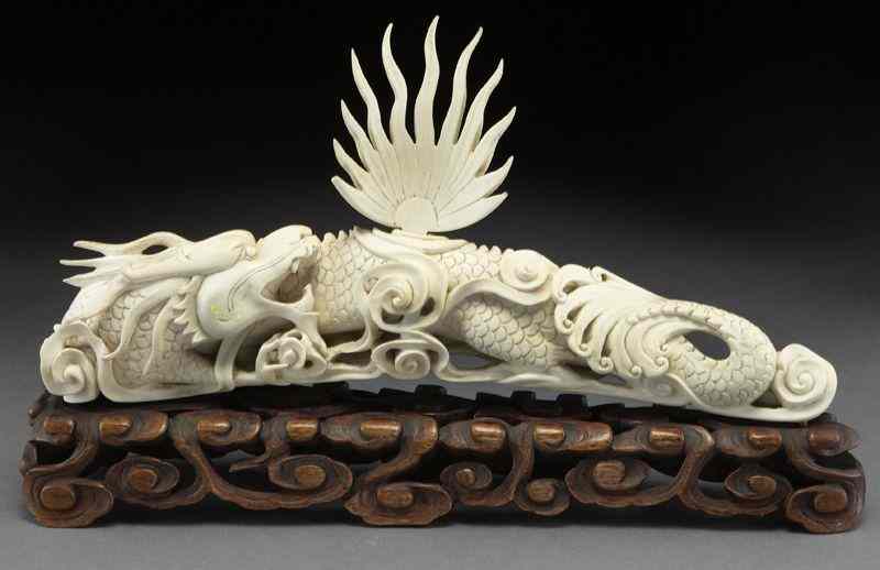 Appraisal: Chinese carved ivory dragon International buyers should note that several