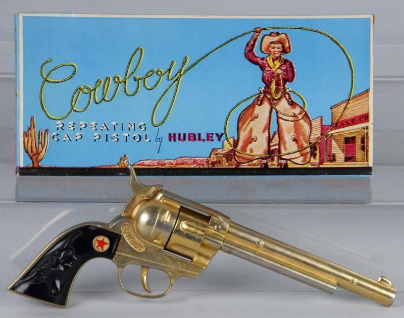 Appraisal: Hubley Gold Cowboy Cap Gun Description Gold finish Has fired