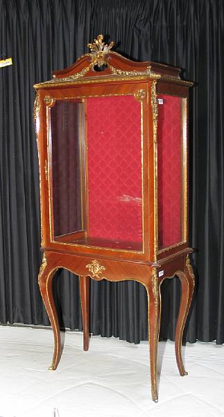 Appraisal: A Louis XV style mahogany bronze mount vitrine cabinet on