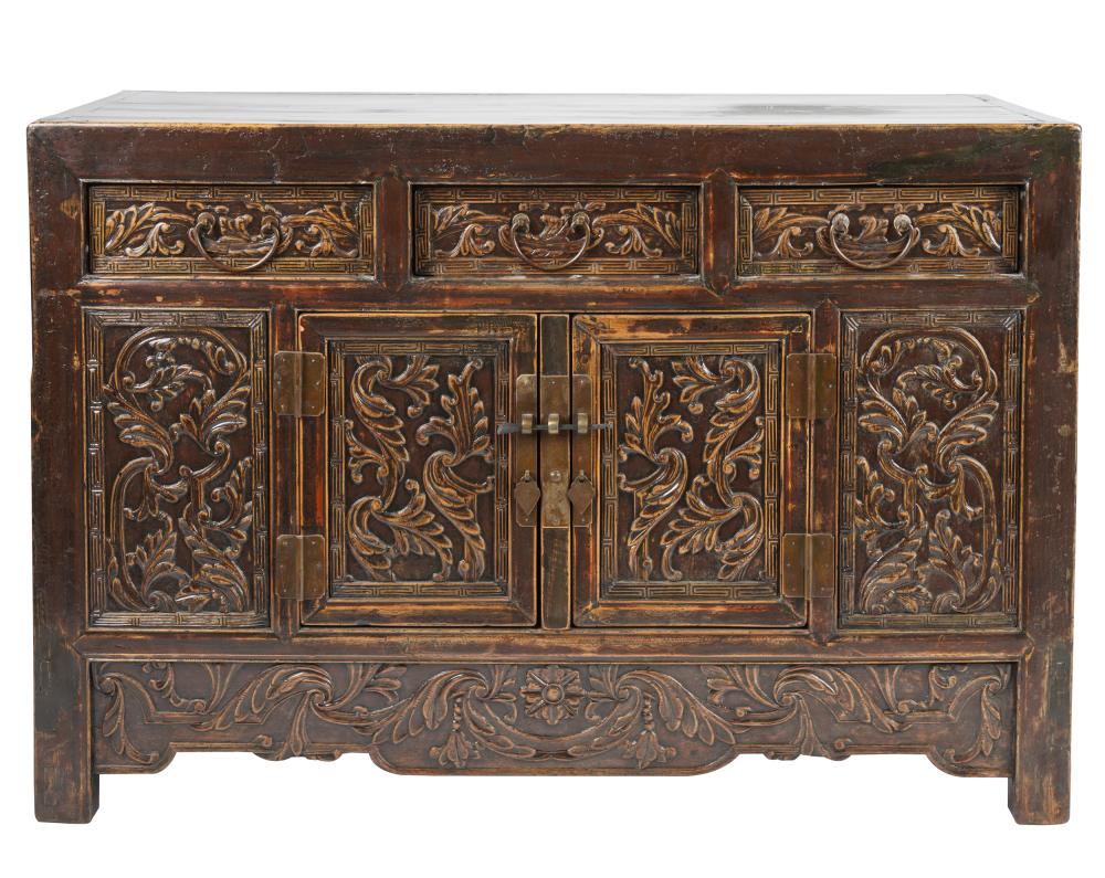 Appraisal: CHINESE CARVED WOOD CABINEThaving three drawers over a pair of