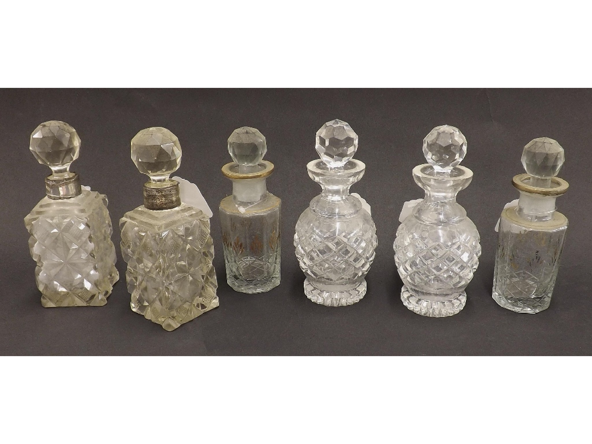 Appraisal: Attractive pair of antique cut glass scent bottles with prismatic