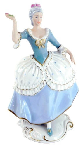 Appraisal: A Royal Dux porcelain figure of a lady in blue