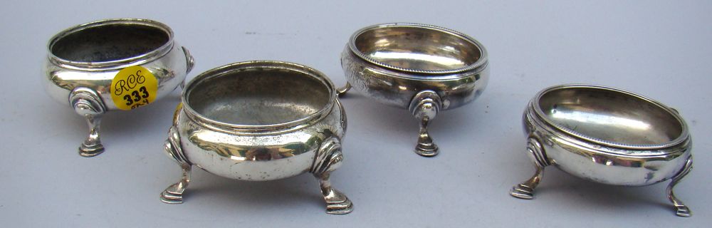 Appraisal: TWO PAIRS OF ENGLISH SILVER OPEN SALTS One pair with