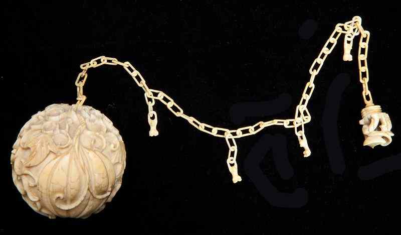 Appraisal: Unusual Chinese Ivory Mystery Ballcarved as a hollow fruit with