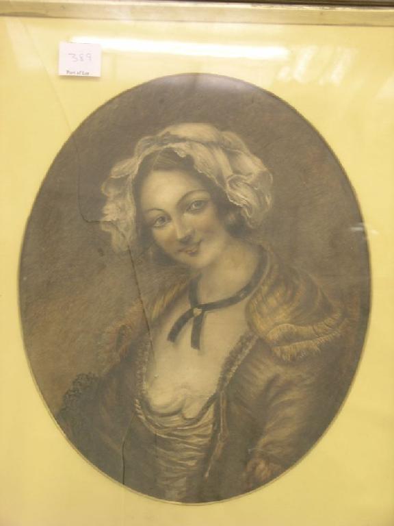 Appraisal: An oval watercolour portrait of a young lady x in