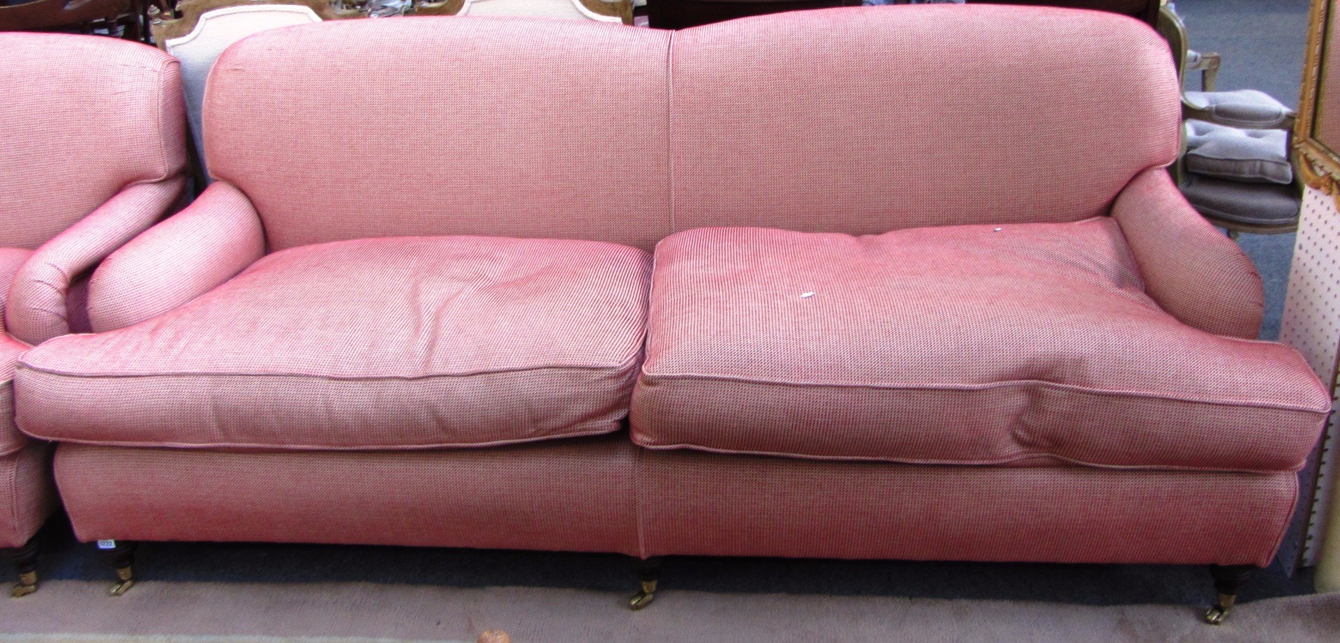 Appraisal: A large th century sofa of Howard design on three