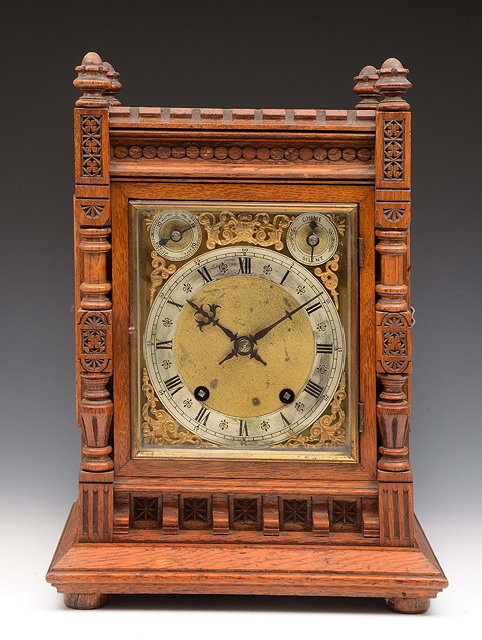 Appraisal: A late Victorian oak bracket clockwith ting tang movement by