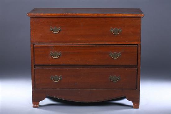 Appraisal: AMERICAN FRUITWOOD MULE CHEST early th century Hinged top opens