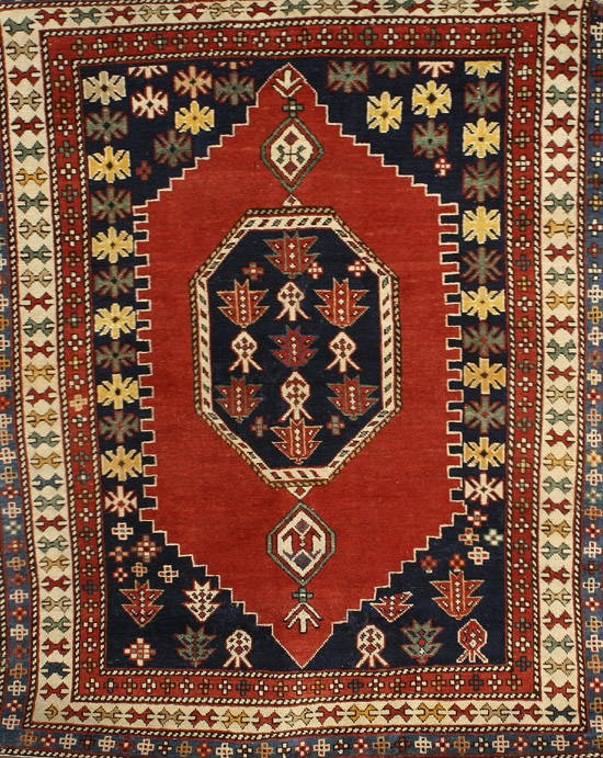 Appraisal: Caucasian Rug First Quarter th Century Blue ground with rosette