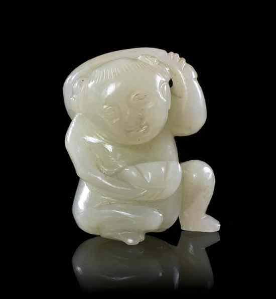 Appraisal: A Small Jade Carving of a Boy of near white