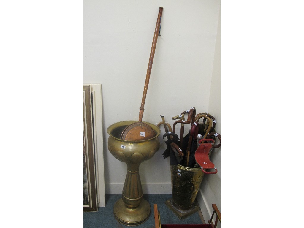 Appraisal: Brass jardiniere brass stick stand and a copper bed warming