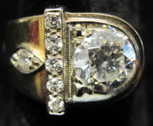 Appraisal: Gentleman's karat yellow gold diamond ringApproximately carat round cut diamond