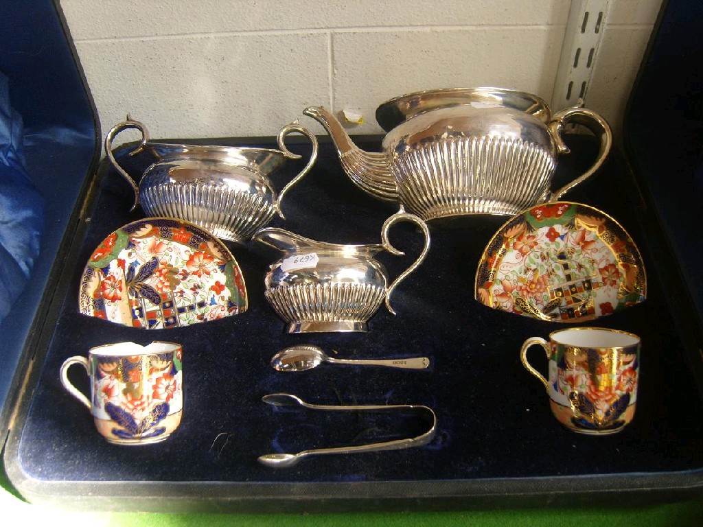 Appraisal: A cased presentation -piece plated tea service of oval form