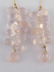 Appraisal: A pair of rose quartz drop earrings with gold fittings