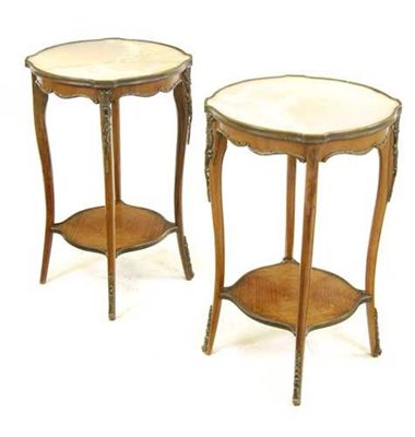 Appraisal: A pair of French rosewood and brass mounted occasional tables