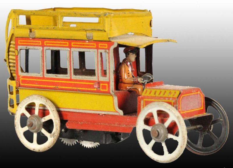 Appraisal: German Tin Wind-Up Penny Toy Bus Description Wind-up working Includes