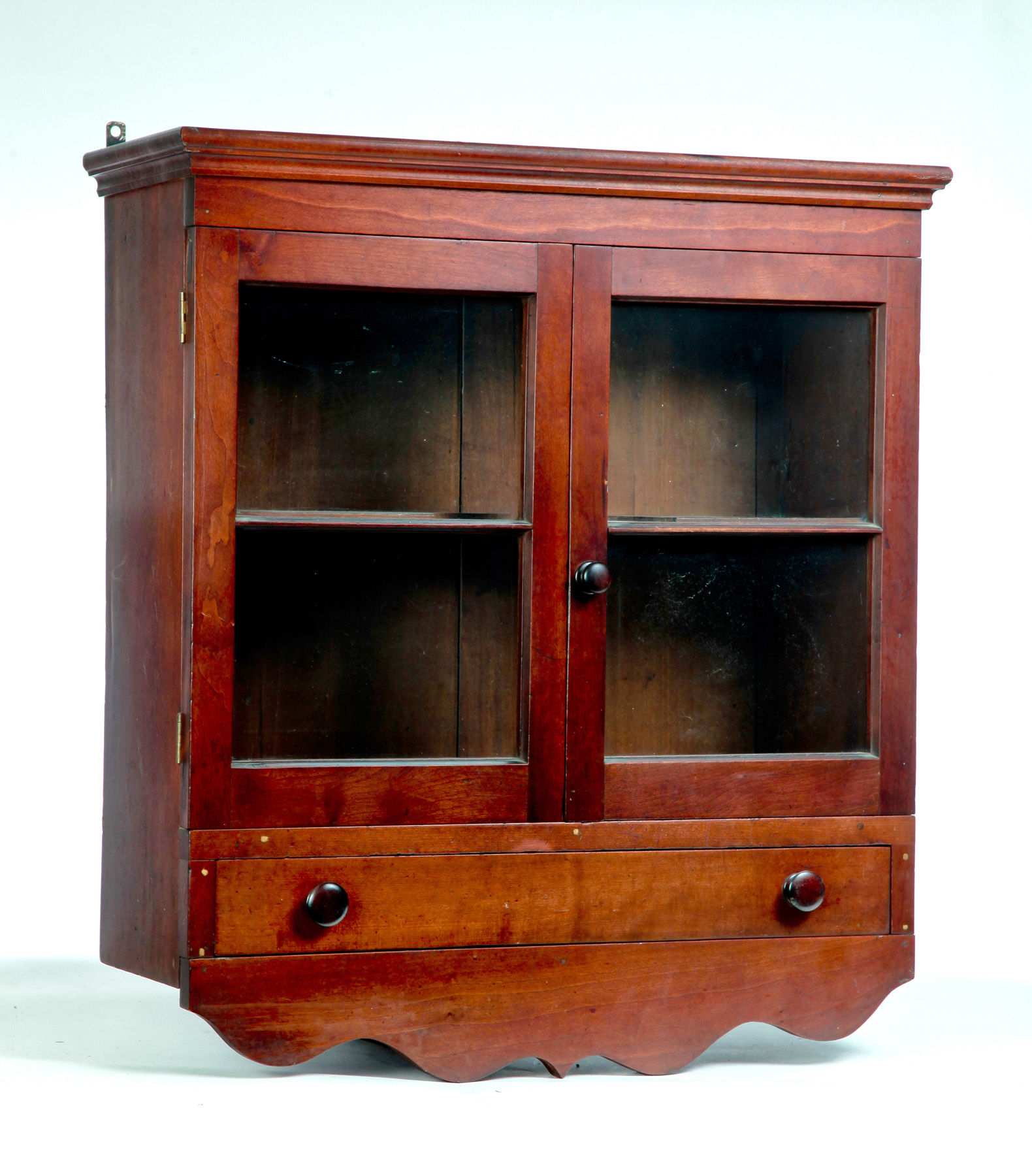 Appraisal: AMERICAN HANGING CABINET Mid th century Dovetailed cherry cabinet with